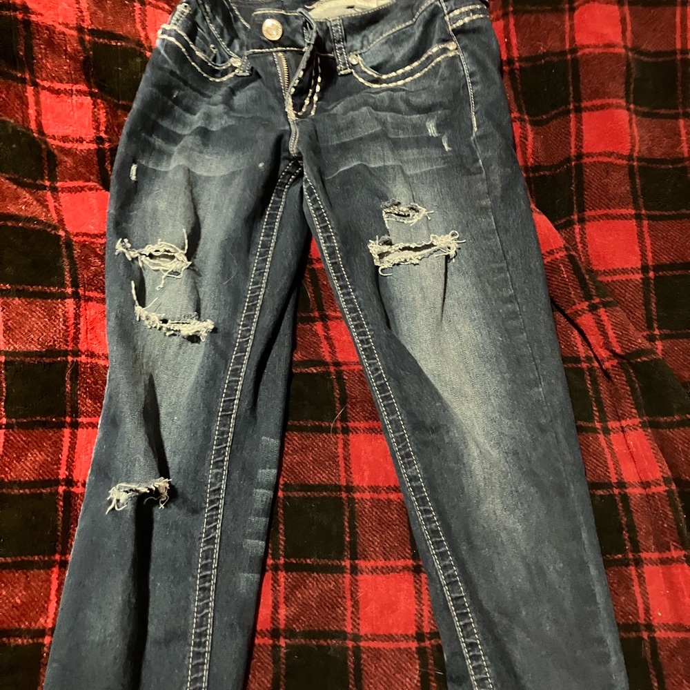 Distressed Blue Skinny Jeans with Tapered Leg